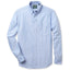 A blue Oxford shirt with a button-down collar, barrel cuffs, and a tacked, V-stitch chest pocket, made in the USA, 100% cotton.